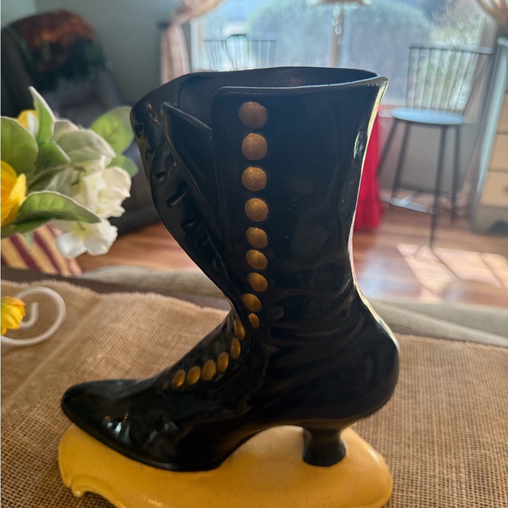 Elegant Black and Gold Heeled Boot Decor